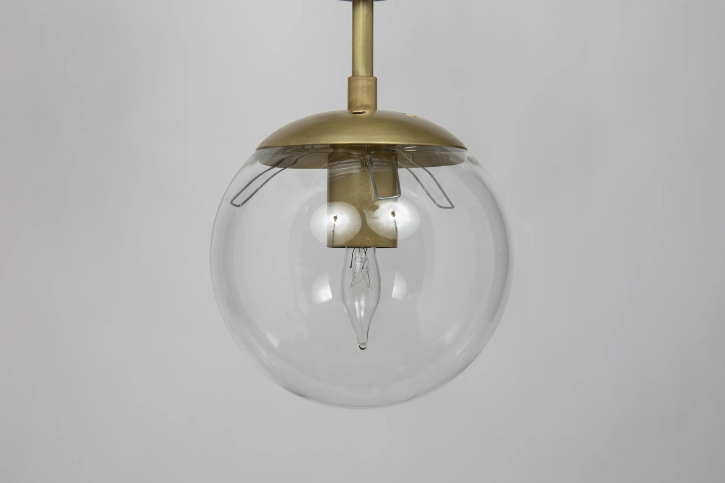 Pluto chandelier, large, metal with brass finish and glass