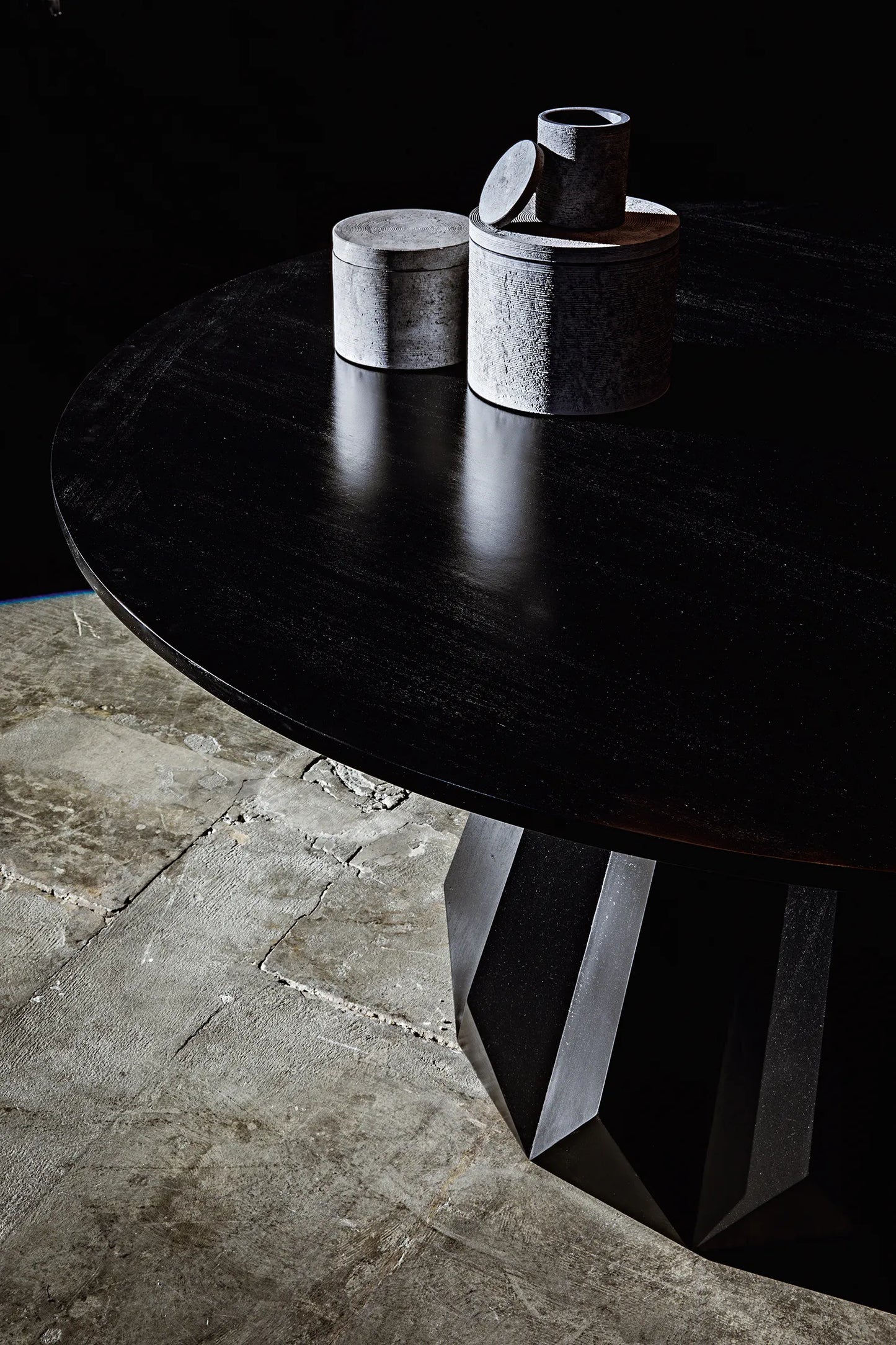 Brosche dining table, hand rubbed black